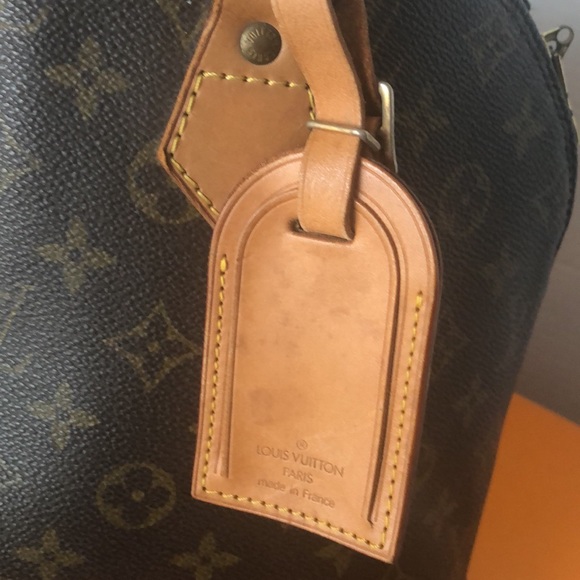 Authentic LOUIS VUITTON Alma Monogram Handbag - Picture 9 of 17